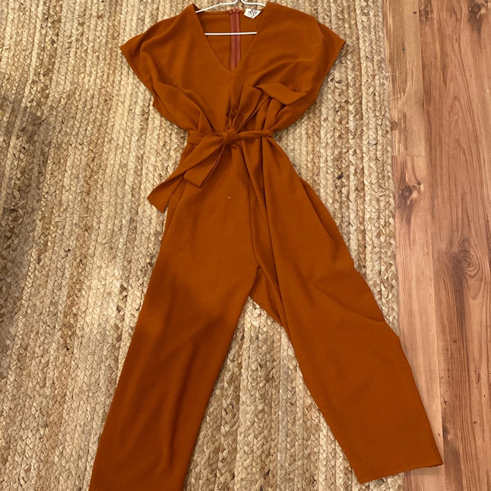 Adorable orange romper with tie. Size S